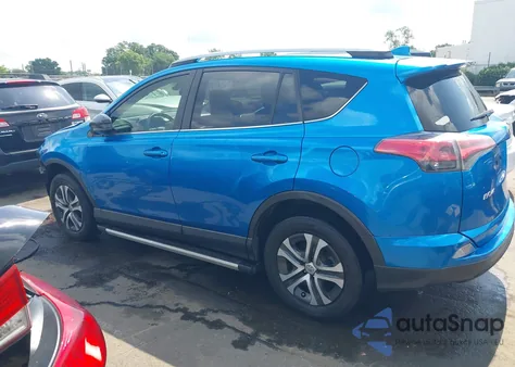 2018 Toyota Rav4 Le z USA, uszkodzony, nr VIN JTMZFREV3JJ731029